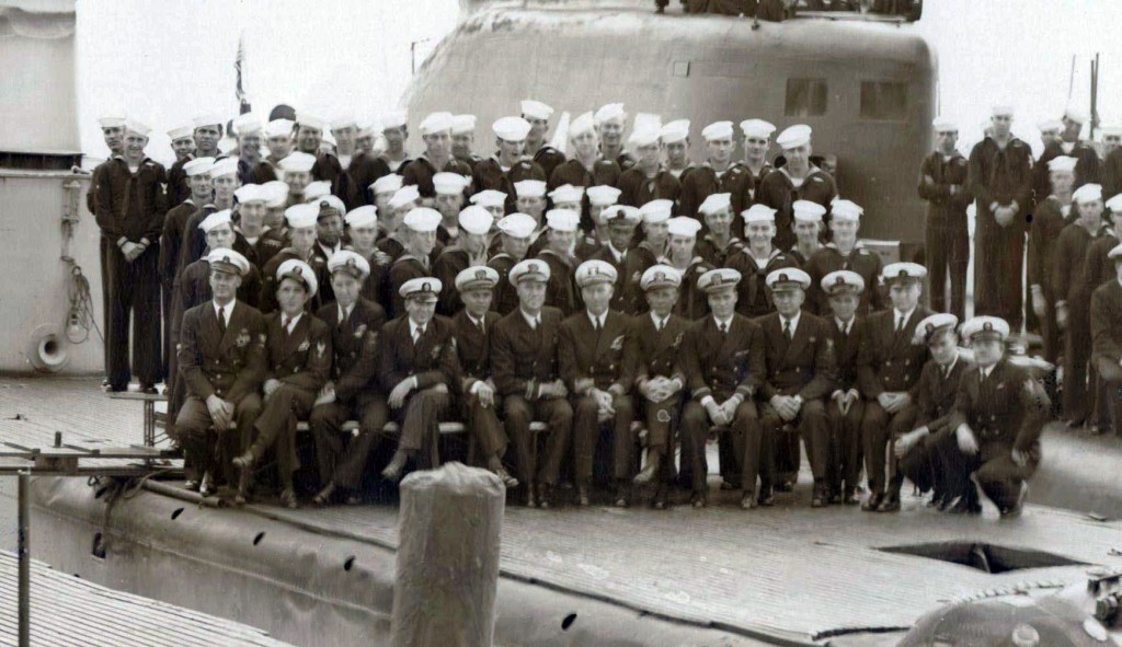 USS Charr (SS-328) crew in 1949. Commander Fahy is seated 7th from the left wearing Commander's stripes and gold braid on his hat.